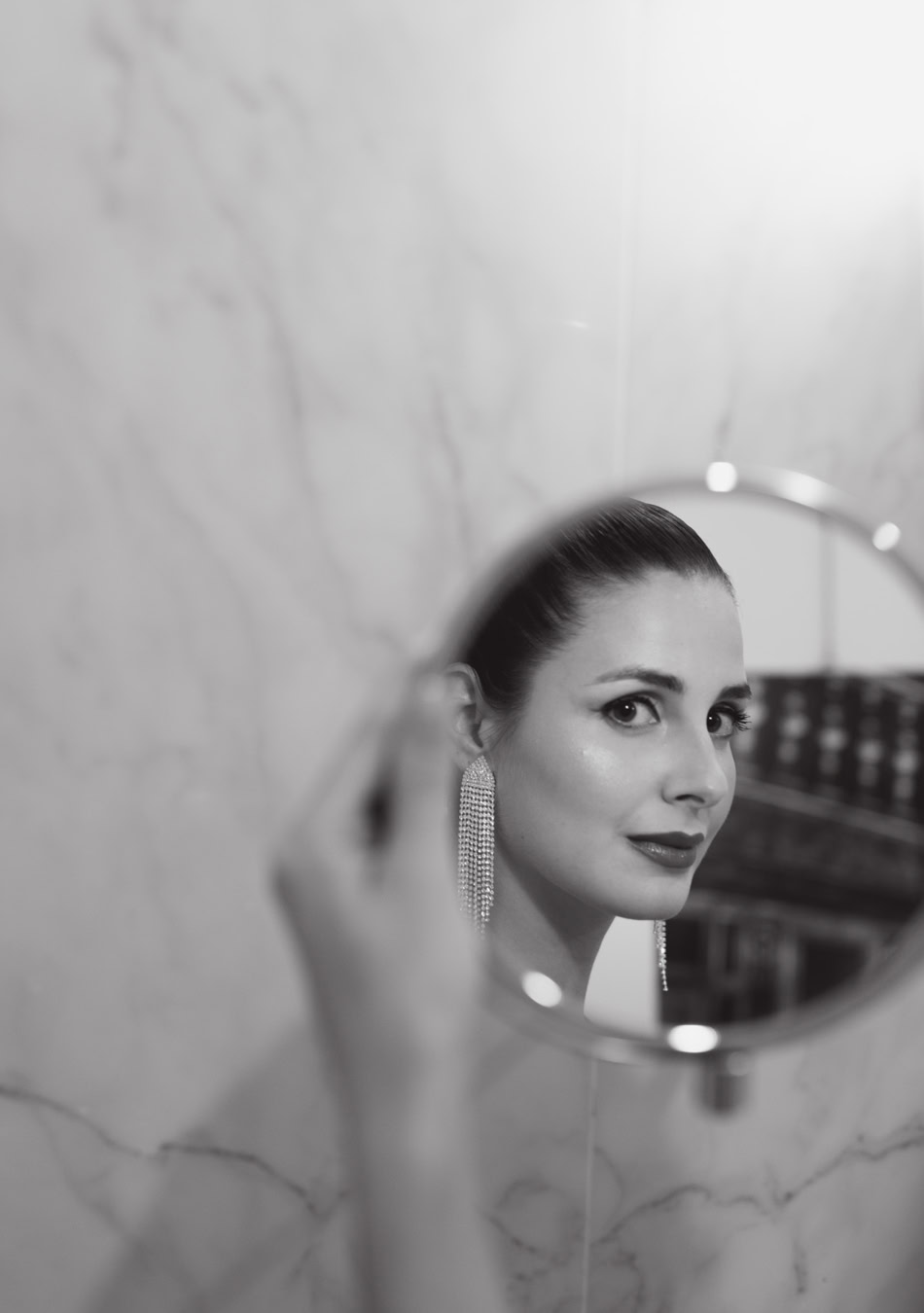 specchio-donna-orecchini